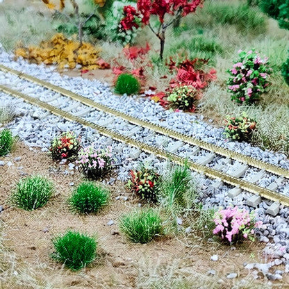 Miniature diorama scene using mixed grass and flower tufts - Wargame Base World