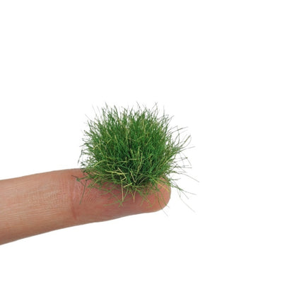 Holding a full sheet of 16mm tall grass tufts - Wargame Base World